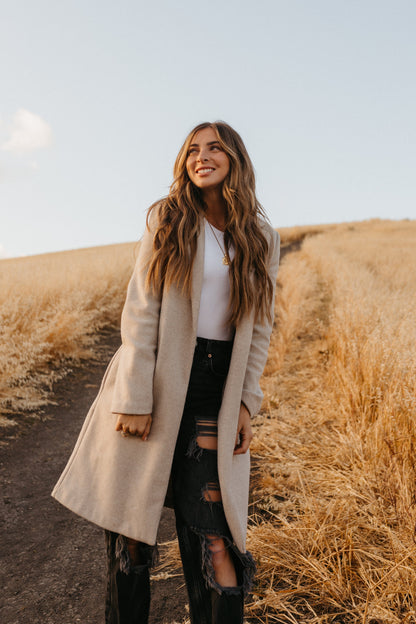 A Model Showcasing Warm Rooted And Low Lighted Bronde Extensions